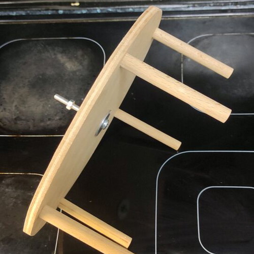 Parrot toy new with rotating bearing and wooden support