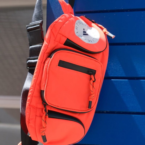 Adidas Stella McCartney large waterproof waist bag, black and orange