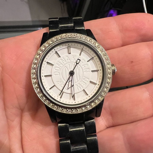DKNY women's watch used with stones and black bracelet