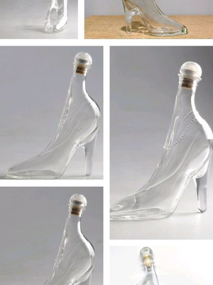 Glass small bottle shaped like stiletto shoe like new
