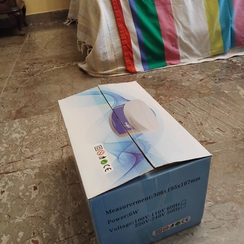 Germix SM-504B UV tool sterilizer like new, white with blue drawer