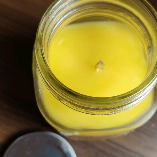 Vanilla scented candle in Flamingo glass jar like new
