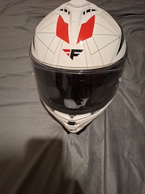 Motorcycle helmet with visor, used