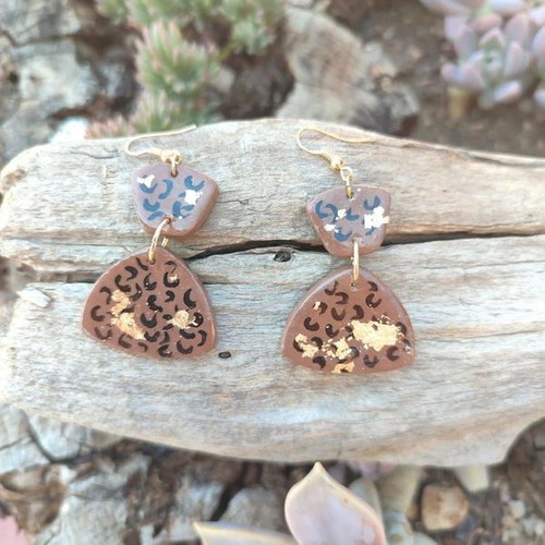 Clay earrings new with painted animal print and gold leaf accents