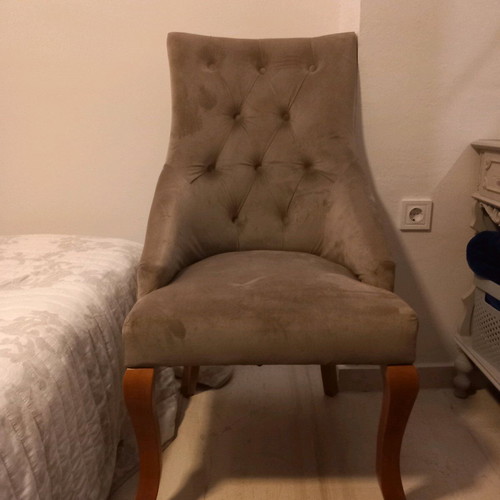 Velvet armchairs like new, one black and one beige with wooden legs