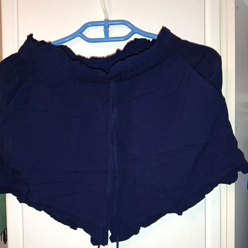 Dark blue shorts with ruffle design, cotton fabric, size M