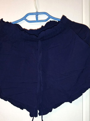 Dark blue shorts with ruffle design, cotton fabric, size M