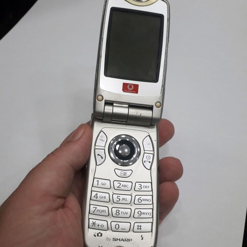Sharp GX30 mobile phone used, silver, missing antenna part