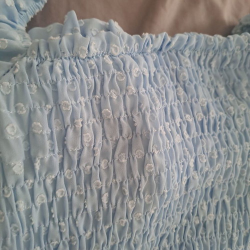 Luigi blue top like new with unique sleeves and bust ties