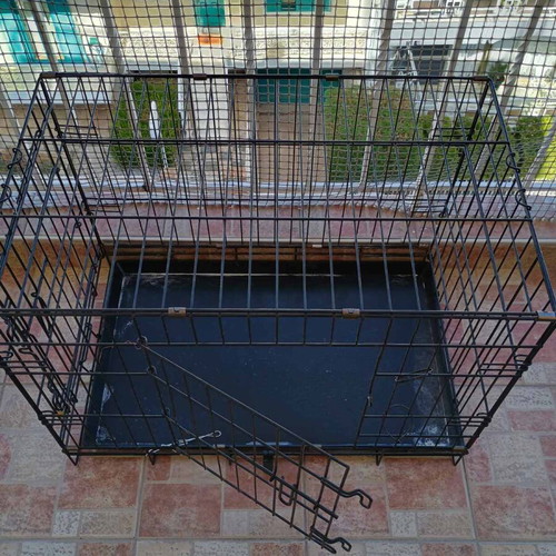 Pet crate used, size M, black with 2 doors