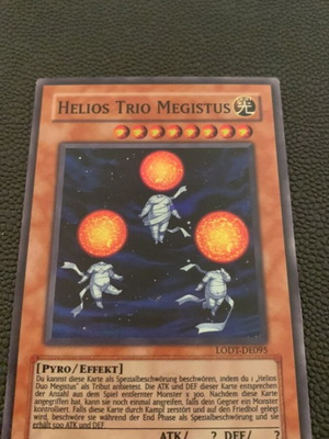 Helios Trio Megistus Yu-Gi-Oh! card like new, vintage