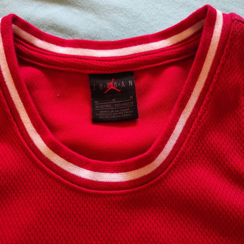 Jordan basketball dress No. 23 like new, size 10-12 years