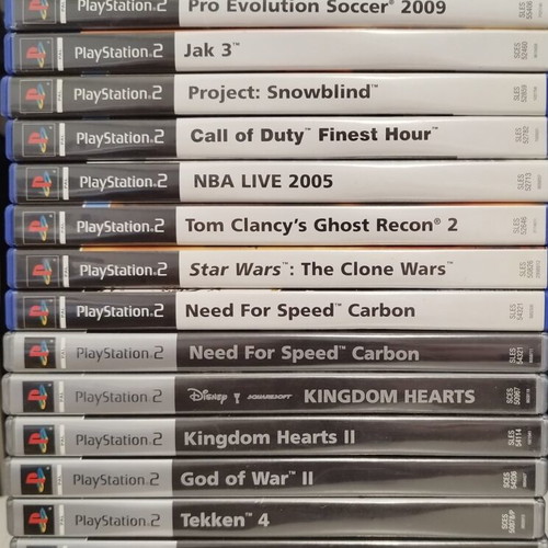 PlayStation 2 Fat console used with 2 controllers, memory card and 21 games