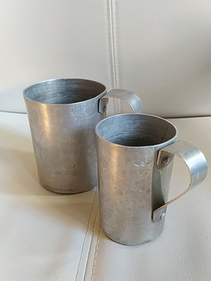Set of 2 used aluminum measuring cups REX 50 and 100 ml