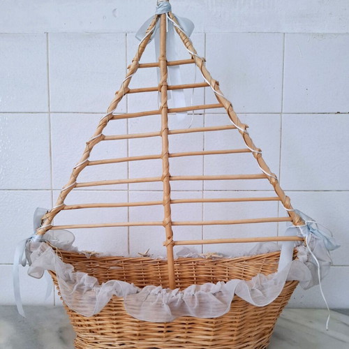 Large wicker basket in sailboat design used