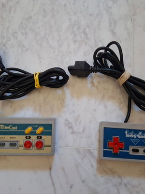 Two Turbo Card gamepads compatible with NES console, one not working