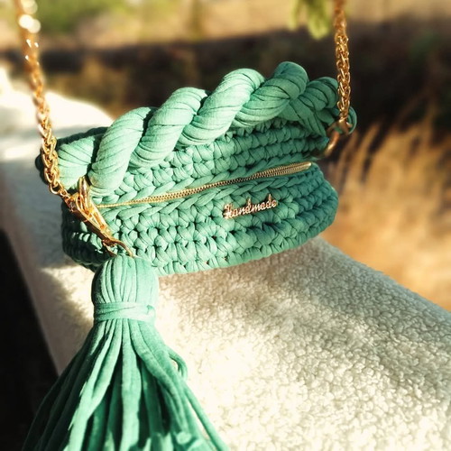 Wooden knitted crossbody bag turquoise new with golden details