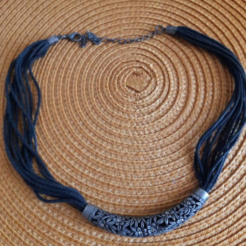 Necklace silver like new with black textile laces
