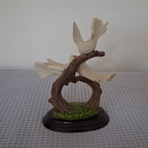 Castello decoration with three white doves on wooden base used