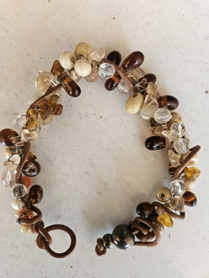 Women's bracelet with stones like new, beige and brown