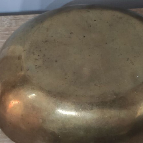 Vintage decorative brass bowl with two handles and wavy rim