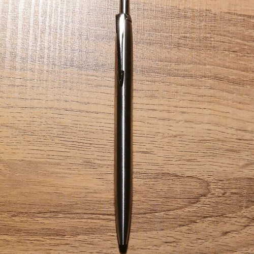 Metal pen silver color new with black ink