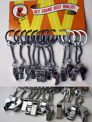 Card with 12 old metal whistle keychains from 1980s new