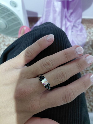 Ring iridescent black like new