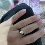 Ring iridescent black like new