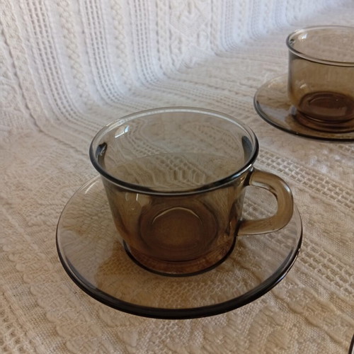 Glass cup set with saucers, large, one cup missing