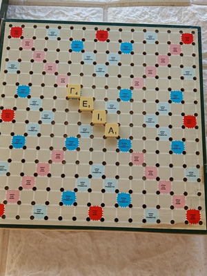 Travel Scrabble board game used, letters lock on board