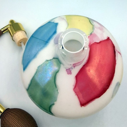 Vintage glass perfume bottle with new atomizer