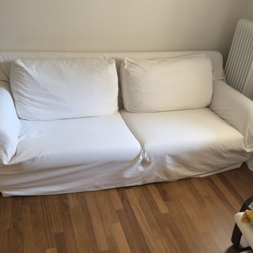 Three-seater sofa with solid wood frame
