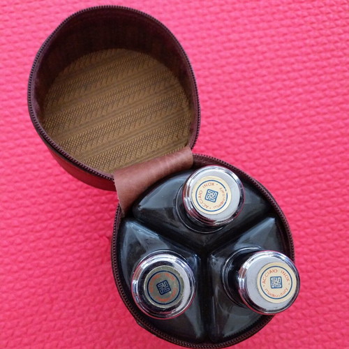 Flask with leather case like new and three bottles