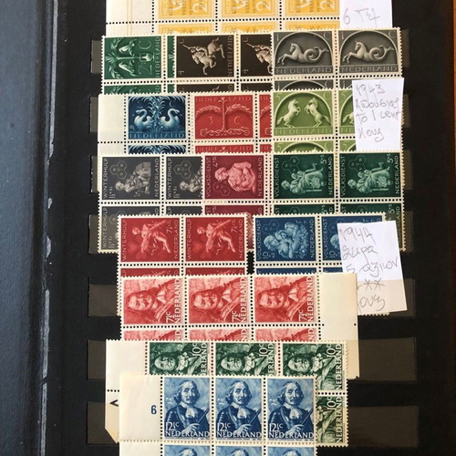 Stamp album with large collection of mint and used blocks worldwide