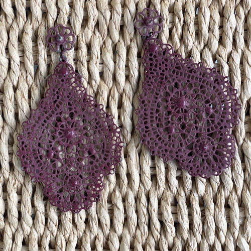 Long burgundy earrings used with color wear
