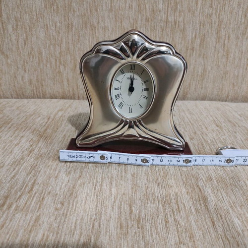 Silver table clock used with rosewood base