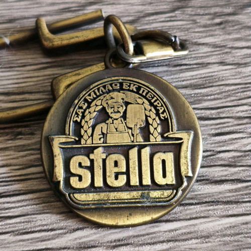 Stella pasta keychain used, vintage metal