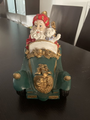 Christmas decoration Santa Claus in vintage car like new