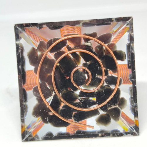 Orgonite pyramid with black obsidian and copper like new