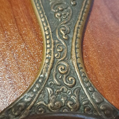Brass hand mirror used with embossed peacock decoration