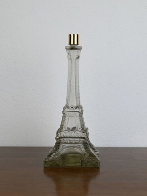 Vintage glass bottle shaped like Eiffel Tower used, souvenir Paris