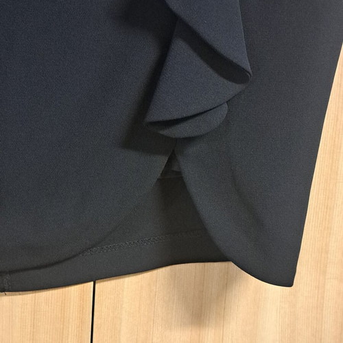 Black skirt with unique left-side design, like new, size XXL