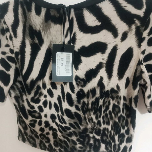 Women’s animal print top with black leather trim new, unworn