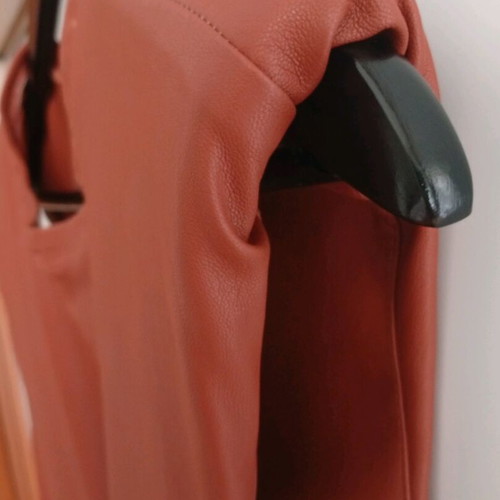 Stradivarius leatherette top new, orange, small with shoulder pads