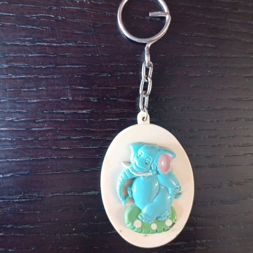 Vintage keychain with blue elephant used
