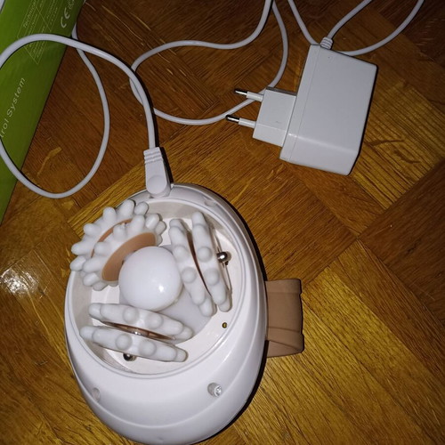 Body Tone massage machine like new with charger and cable