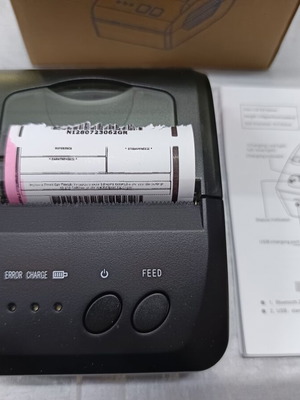 Portable thermal receipt printer