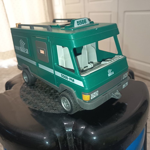 Playmobil car and dragon used with many damages