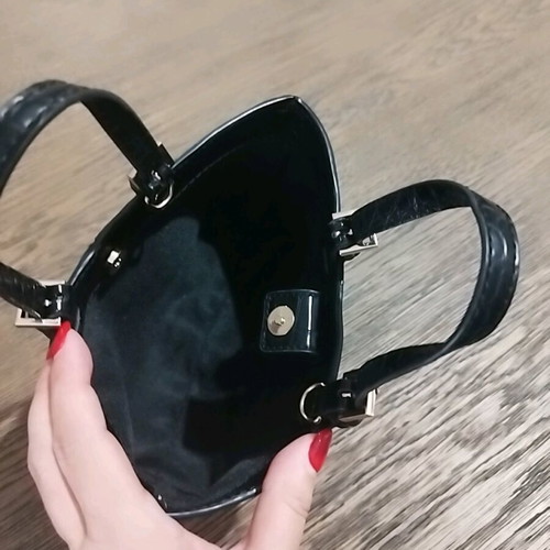Small black handheld bag with croco texture like new